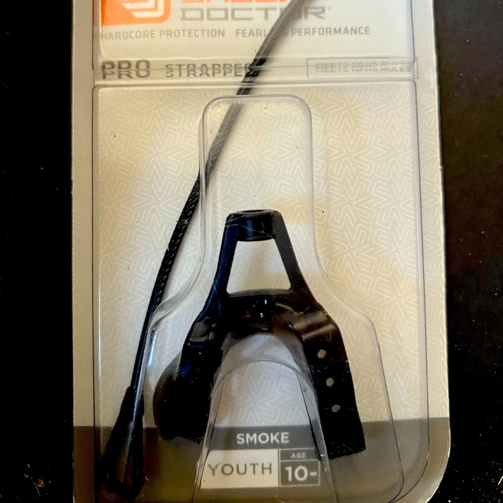 DONATED YTH STRAPPED MOUTH GUARD